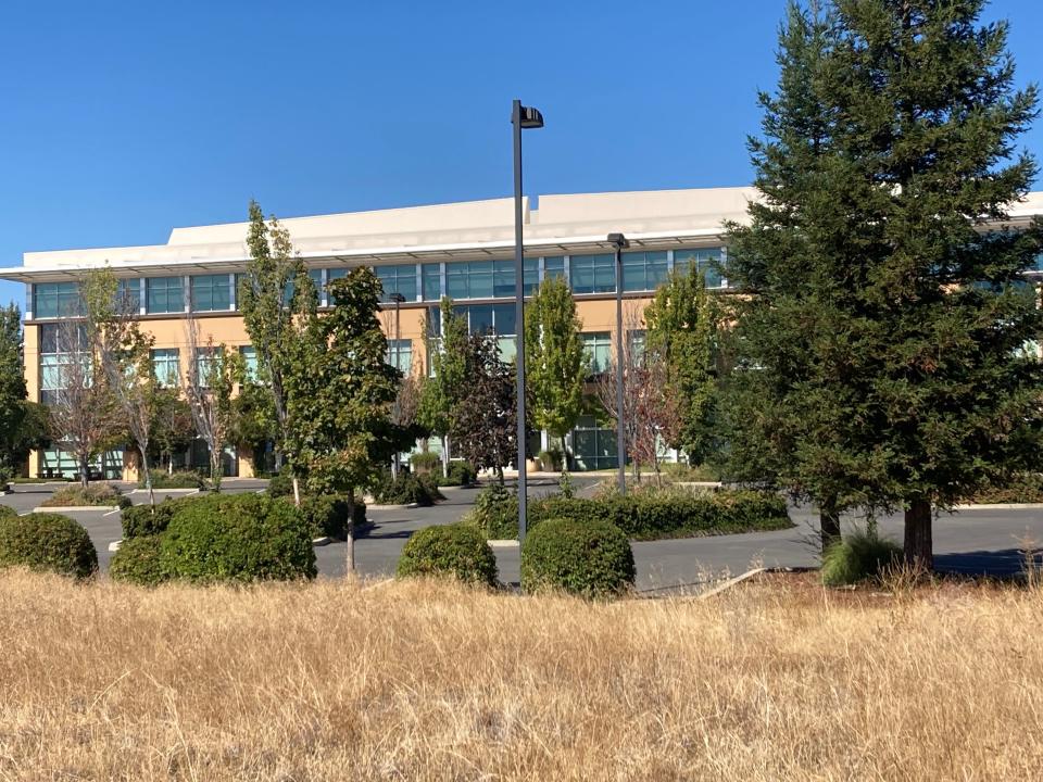 The parking lot at the State Fund building in Redding sits empty in this October 2021 file photo. The company said employees have been working remotely since the start of the COVID-19 Pandemic in 2020.
