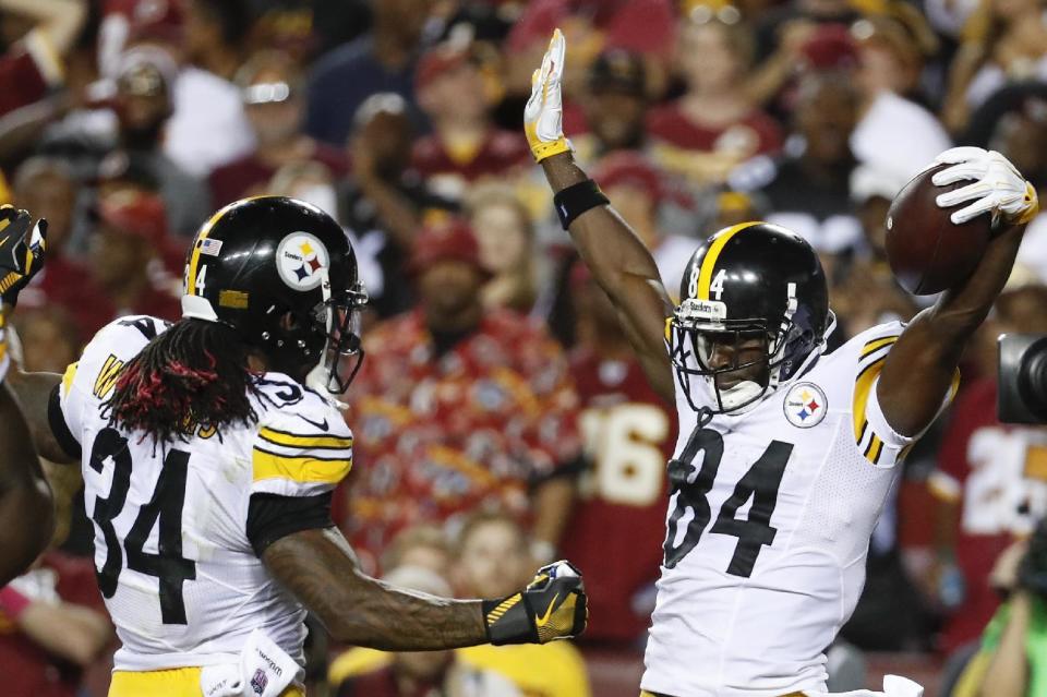 Pittsburgh Steelers wide receiver Antonio Brown (84) celebrates his touchdown with running back DeAngelo Williams (34) during the first half of an NFL football game against the Washington Redskins in Landover, Md., Monday, Sept. 12, 2016. (AP Photo/Alex Brandon)