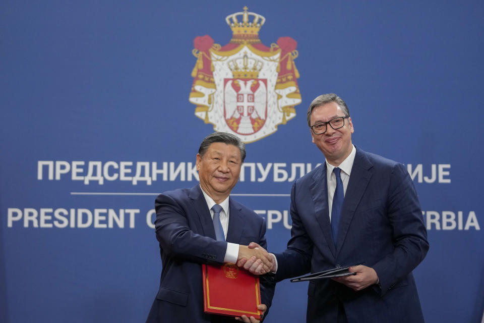 FILE - Chinese President Xi Jinping, left, shakes hands with Serbian President Aleksandar Vucic at the Serbia Palace, in Belgrade, Serbia, Wednesday, May 8, 2024. Most countries in the European Union are making efforts to “de-risk” their economies from perceived threats posed by China. But Hungary and Serbia have gone in the other direction. They are courting major Chinese investments in the belief that the world’s second-largest economy is essential for Europe’s future. (AP Photo/Darko Vojinovic, File)