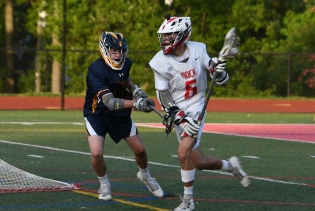 Glen Rock attacker Josh Bosin (6) looks for an opening against Ramsey in the North Group 1 boys lacrosse semifinal. May 25, 2022.