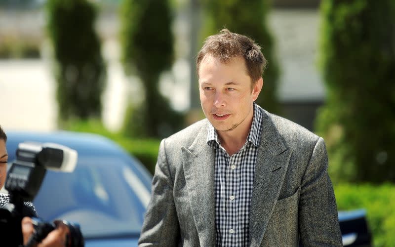 FILE PHOTO: Tesla Chief Executive Officer Elon Musk leaves a press event at his company's factory in Fremont