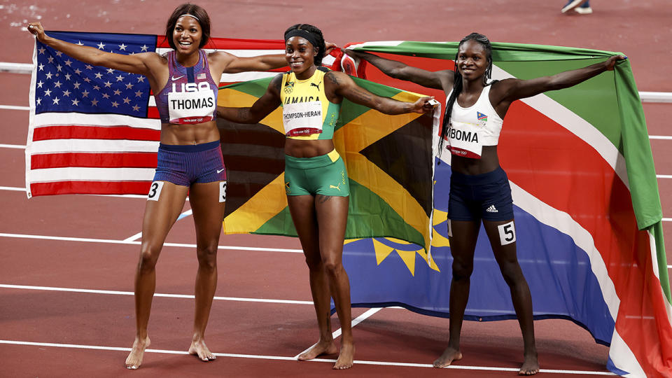 Gabby Thomas, Elaine Thompson-Herah and Christine Mboma, pictured here celebrating after the 200m final.