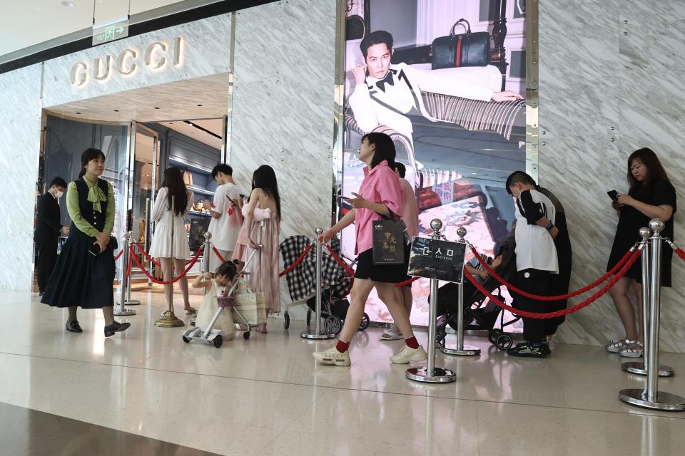 Customers enter a Gucci store at Sanya International Duty Free Shopping Complex on June 28, 2023 in Sanya, Hainan Province of China. (Photo by Jiang Qiming/China News Service/VCG via Getty Images)