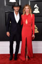 <p>Country’s cutest couple walked the red carpet looking as flawless as usual. Hill stunned in a long-sleeved red Zuhair Murad gown with cutout detailing. </p>