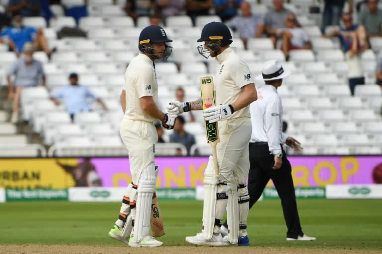 England's Jos Buttler and Ben Stokes celebrated reaching a century partnership as they frustrated India on Tuesday afternoon