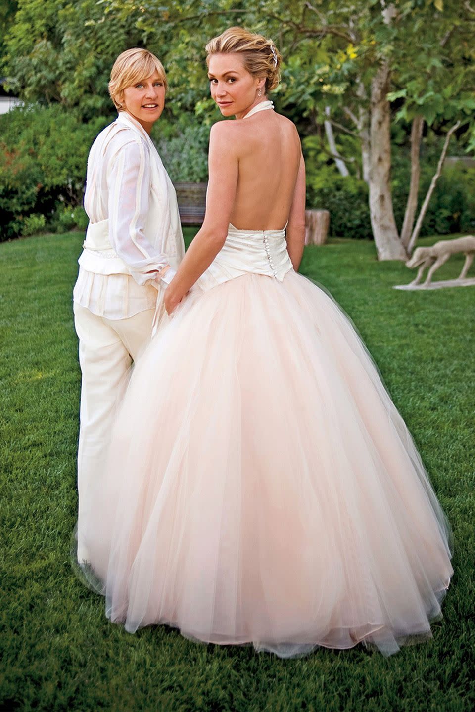 <p>The actress wed Ellen DeGeneres in a blush-pink ballgown with a high halter and cloud-like tulle skirt by Zac Posen. Simultaneously modern and romantic, it was fit for a fairytale.</p>