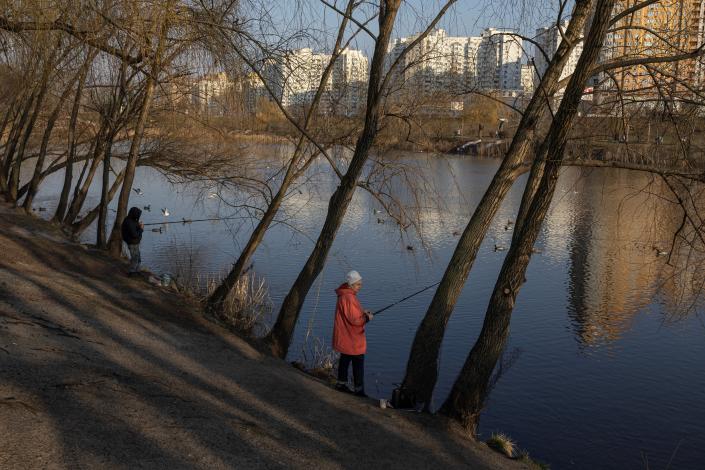 Anglers still find time to go fishing in one of Kyiv&#x002019;s parks (REUTERS)