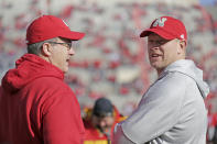 Nebraska head coach Scott Frost, right, and Wisconsin head coach Paul Chryst talk before an NCAA college football game in Lincoln, Neb., Saturday, Nov. 16, 2019. (AP Photo/Nati Harnik)