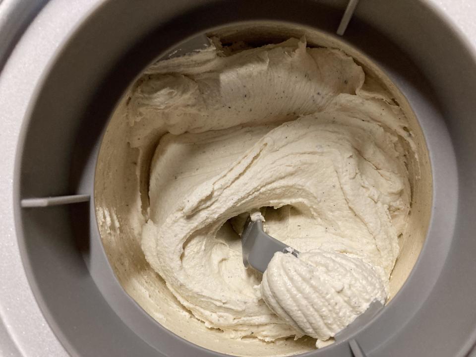 homemade ice cream in ice cream maker, churning