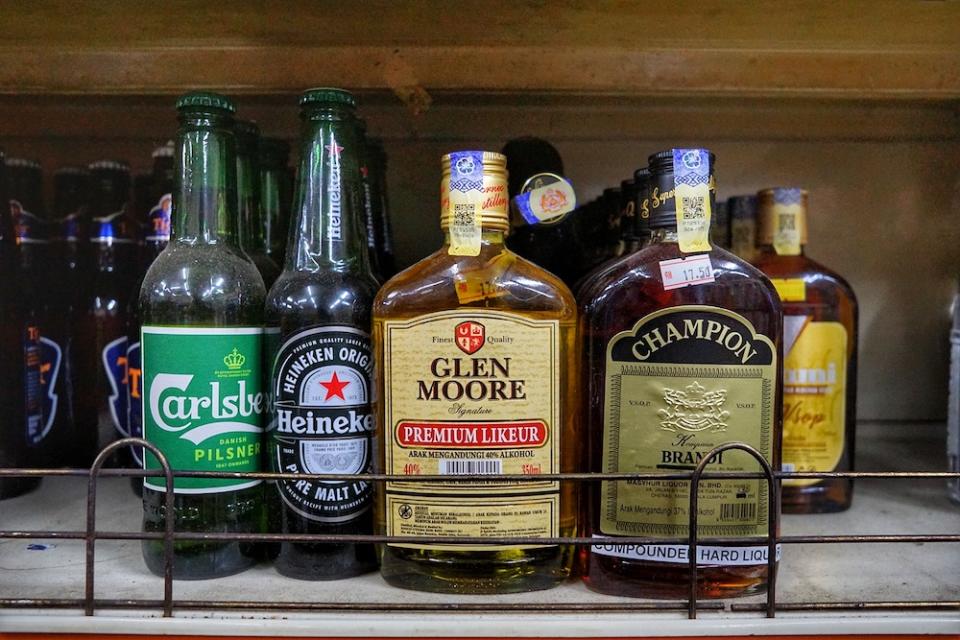 Bottles of liquor that are being sold are seen in a convenience shop in Kuala Lumpur November 19, 2020. — Picture by Ahmad Zamzahuri