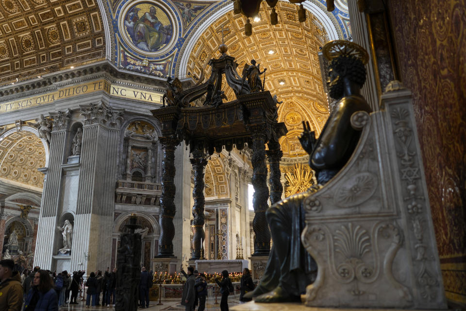 A view of the 17th century, 95ft-tall bronze canopy by Giovan Lorenzo Bernini surmounting the papal Altar of the Confession in St. Peter's Basilica at the Vatican, Wednesday, Jan. 10, 2024. Vatican officials unveiled plans Thursday, Jan.11, for a year-long, 700,000 euro restoration of the monumental baldacchino, or canopy, of St. Peter's Basilica, pledging to complete the first comprehensive work on Bernini's masterpiece in 250 years before Pope Francis' big 2025 Jubilee. (AP Photo/Andrew Medichini)