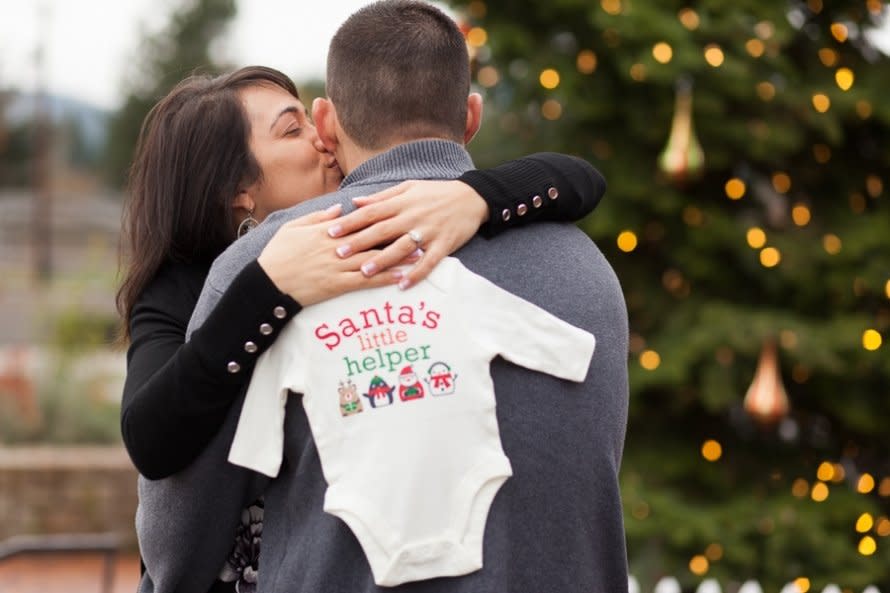 From baby bumps dressed in holiday lights to ugly-sweater parties, get inspired by these genius Christmas pregnancy announcement ideas submitted by happy parents-to-be.