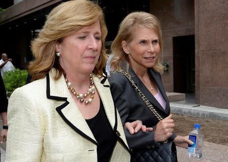 Sumner Redstone's daughter Shari Redstone (R) and her lawyer leave a downtown Los Angeles where her father's former girlfriend Manuela Herzer is suing the 92 year-old controlling shareholder of Viacom and CBS in Los Angeles, California May 6, 2016. REUTERS/Kevork Djansezian