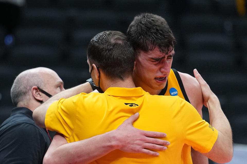 INDIANAPOLIS, IN - MARCH 22: Luka Garza #55 of the Iowa Hawkeyes reacts to the teams loss against the Oregon Ducks in the second round of the 2021 NCAA Division I Mens Basketball Tournament held at Bankers Life Fieldhouse on March 22, 2021 in Indianapolis, Indiana. (Photo by Jack Dempsey/NCAA Photos via Getty Images)