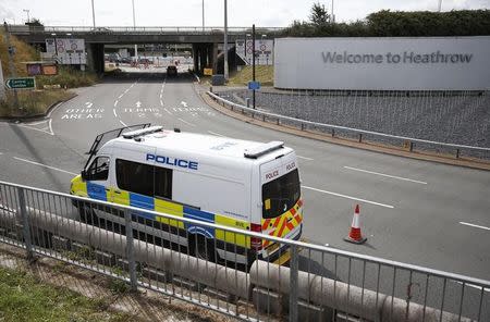 A police van is parked near to the entrance to Heathrow Airport, following a protest by the 'Black Lilves Matter' movement, in London, Britain August 5, 2016. REUTERS/Peter Nicholls