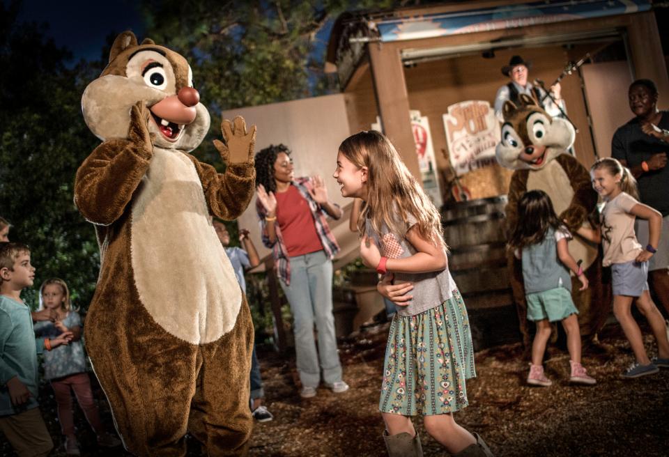 Guests can meet Chip 'n' Dale in person at Chip ‘n’ Dale’s Campfire Sing-a-Long at Fort Wilderness.