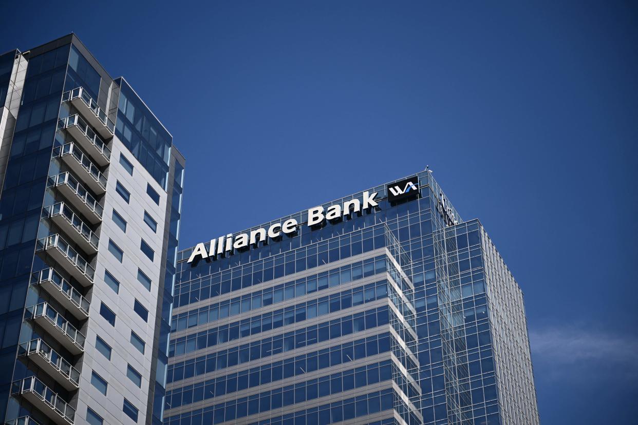 Western Alliance Bank signage is displayed on the Western Alliance Bancorp Headquarters in downtown Phoenix, Arizona, on April 27, 2023. - Shares in leading US banks, including JPMorgan Chase, were down in late morning trading in New York on Tuesday. Meanwhile those in regional banks suffered huge declines. Shares of PacWest Bancorp sank around 35 percent, while Comerica lost 13.6 percent. (Photo by Patrick T. Fallon / AFP) (Photo by PATRICK T. FALLON/AFP via Getty Images)