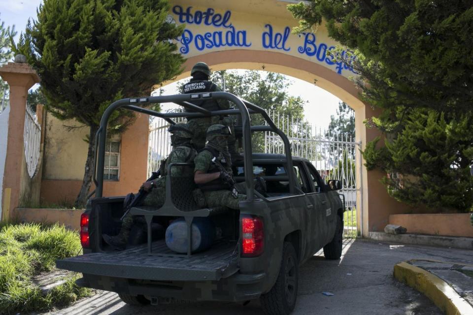 Mexican soldiers guard the funeral of Ocampo municipality Mayor and candidate for the Democratic Revolutionary Party (PRD), Fernando Ángeles Juárez (AFP/Getty Images)