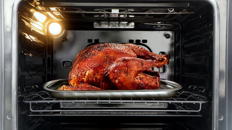 A Thanksgiving turkey roasting in the oven