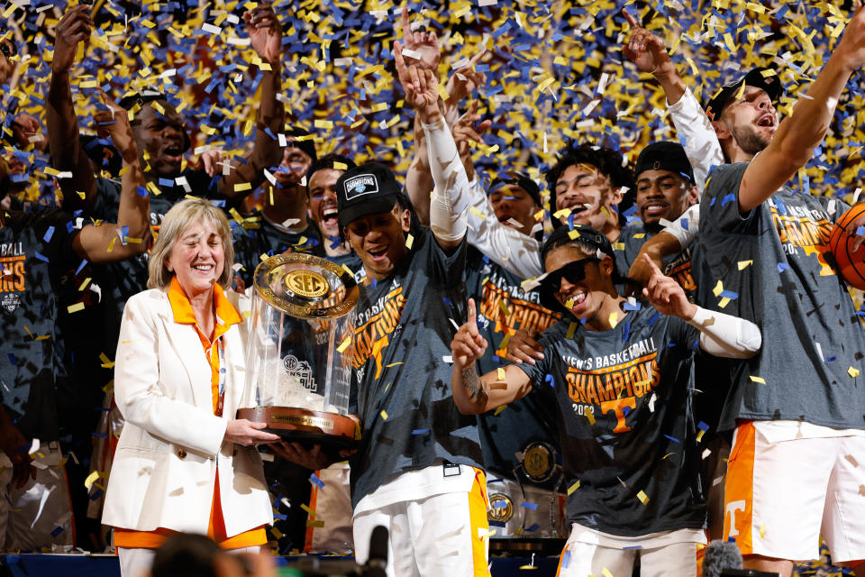 Mar 13, 2022; Tampa, FL, USA; Members of the Tennessee Volunteers celebrate after defeating the Texas A&M Aggies in the SEC championship game at Amelie Arena. Mandatory Credit: Nathan Ray Seebeck-USA TODAY Sports