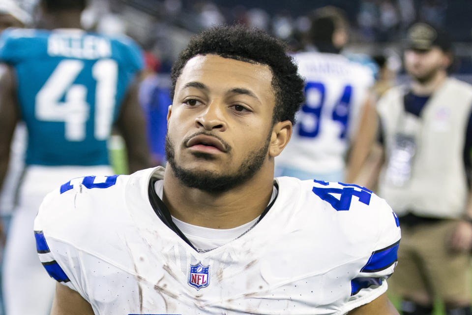 FILE - Dallas Cowboys running back Deuce Vaughn (42) is seen after an NFL football game, Saturday, Aug. 12, 2023, in Arlington, Texas. Vaughn is among the young running backs who say they love their position on the field and aren't swayed away from it by the recent hesitancy of NFL teams in handing out big contracts to running backs. (AP Photo/Brandon Wade, File)