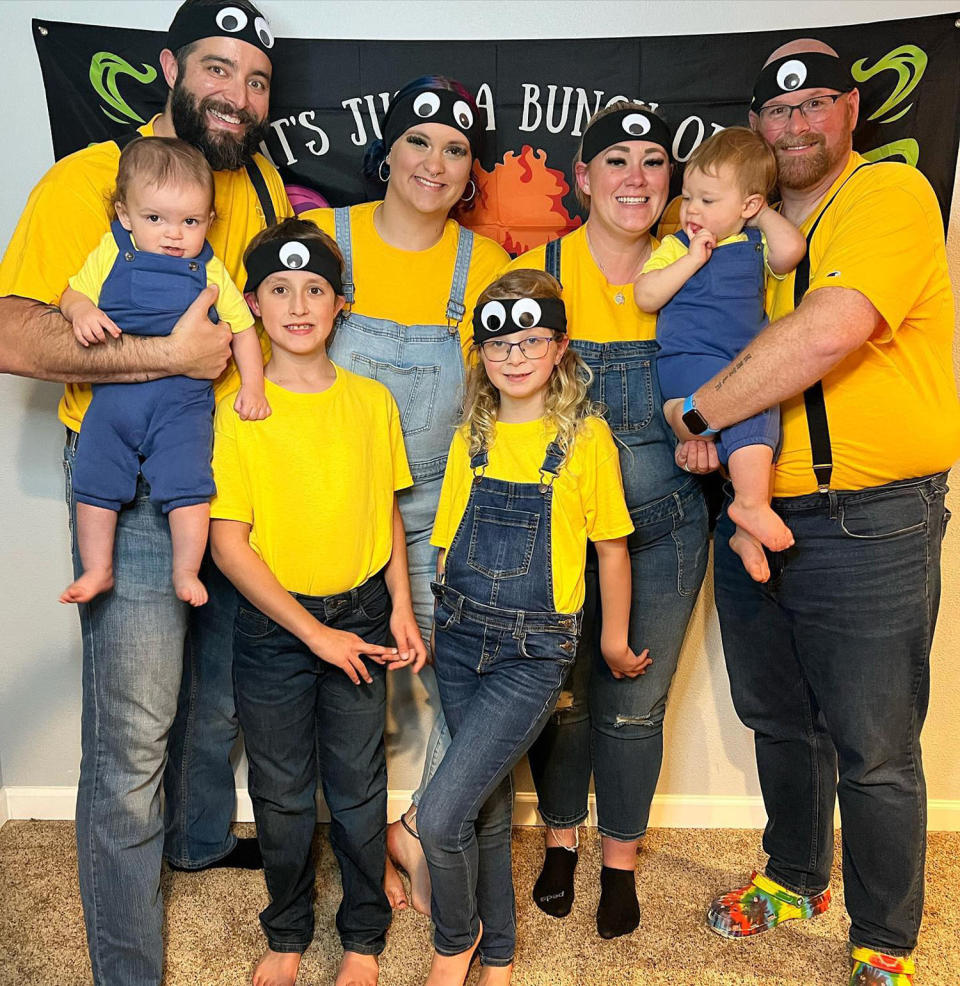 Alysia, Tyler, Sean and Taya, pictured with their four children on Halloween. (@polyfamory via Instagram )