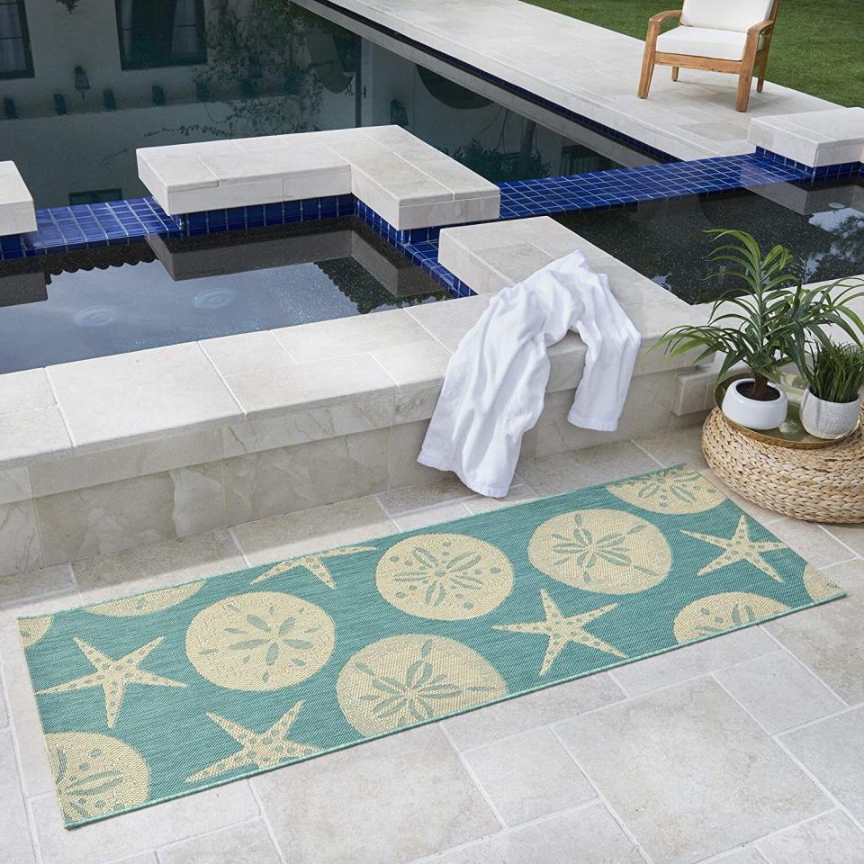 Add a touch of the sea to your outdoor furniture setup. The rug's material also feels nice on your feet and is really easy to clean. (Spills and messes, be gone!)<br /><br /><strong>Promising review:</strong> "The colors are what was pictured (often times hard to tell online). It is more textured and detailed than I thought from seeing it online. <strong>Also, it washes well. The first day I put it out, my child dropped some chocolate ice cream on it, and I was able to wash it off immediately with just water from a watering can!</strong> " &mdash; <a href="https://amzn.to/3vgjPpE" target="_blank" rel="nofollow noopener noreferrer" data-skimlinks-tracking="5580838" data-vars-affiliate="Amazon" data-vars-href="https://www.amazon.com/gp/customer-reviews/R5O91NYWW5EEJ?tag=bfgenevieve-20&amp;ascsubtag=5580838%2C26%2C33%2Cmobile_web%2C0%2C0%2C1159948" data-vars-keywords="cleaning" data-vars-link-id="1159948" data-vars-price="" data-vars-product-id="16176939" data-vars-retailers="Amazon">Amazon Customer</a>﻿<br /><br /><strong>Get it from Amazon for <a href="https://amzn.to/3ncGTTC" target="_blank" rel="nofollow noopener noreferrer" data-skimlinks-tracking="5580838" data-vars-affiliate="Amazon" data-vars-asin="B084HQK9BR" data-vars-href="https://www.amazon.com/dp/B084HQK9BR?tag=bfgenevieve-20&amp;ascsubtag=5580838%2C26%2C33%2Cmobile_web%2C0%2C0%2C1159926" data-vars-keywords="cleaning" data-vars-link-id="1159926" data-vars-price="" data-vars-product-id="16176938" data-vars-product-img="https://m.media-amazon.com/images/I/41R6fYGOVFL.jpg" data-vars-product-title="Gertmenian Tropical Modern Outdoor Rug Simple Patio Carpet Sand Dollar Starfish Oasis Green 2x6 Runner" data-vars-retailers="Amazon">$40.50+</a> (available in five sizes).</strong>