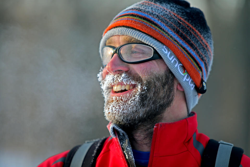 CORRECTS YEAR - Greg Rohde has an ice and snow encrusted beard after commuting to work at the University of Minnesota by cross-country skis along West River Parkway in the frigid -20 weather, Monday, Jan. 6, 2014, in Minneapolis. (AP Photo/The Star Tribune, Elizabeth Flores ) MANDATORY CREDIT; ST. PAUL PIONEER PRESS OUT; MAGS OUT; TWIN CITIES TV OUT