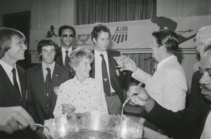 <span class="article__caption">President Reagan honored the U.S. Ski Team and the U.S. Davis Cup tennis team during a reception in the East Room of the White House in 1982. </span>(Photo: Getty Images)