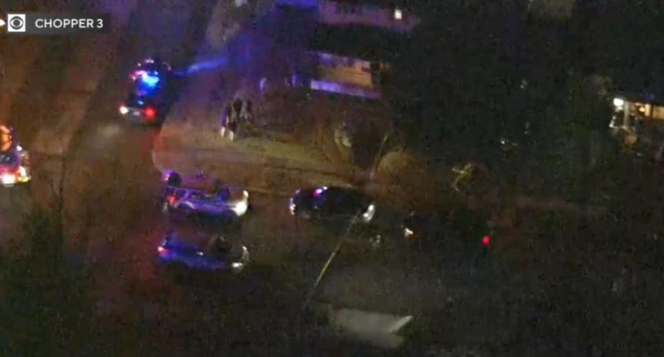 Police flood the scene of the shooting. CBS