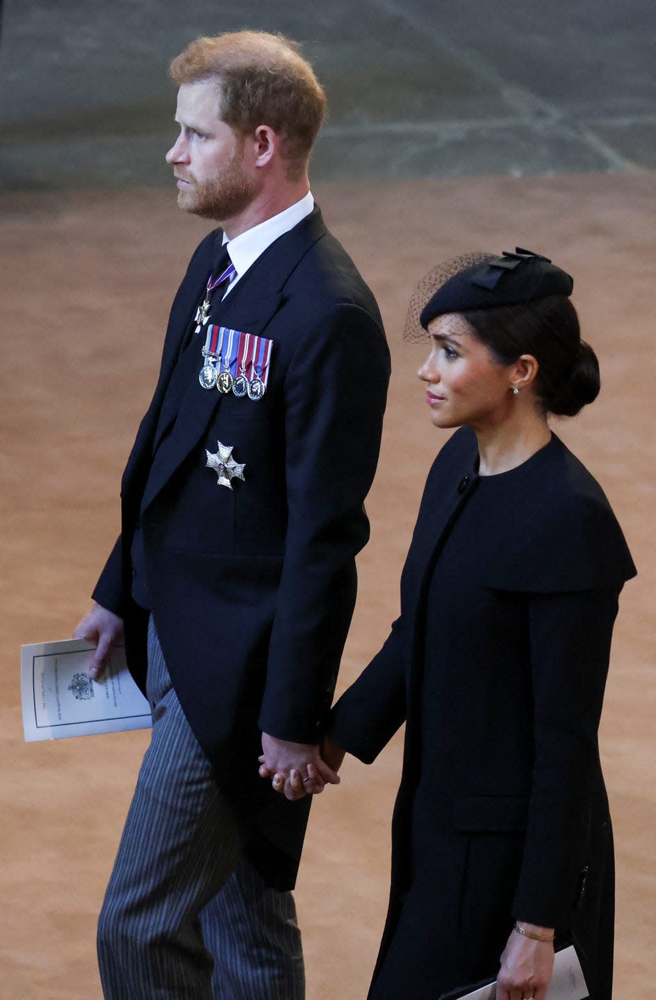 the coffin carrying queen elizabeth ii is transferred from buckingham palace to the palace of westminster