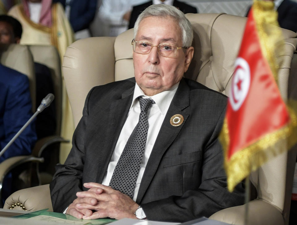 FILE - In this March 31, 2019 file photo, Algeria's Abdelkader Bensalah attends the opening session of the 30th Arab Summit in Tunis, Tunisia. The parliament on Tuesday named Abdelkader Bensalah, the leader of parliament's upper chamber, as president for a maximum 90 days as is called for by the constitution until a new election can be organized. Bensalah was a key ally of Bouteflika. (Fethi Belaid/ Pool photo via AP, File)