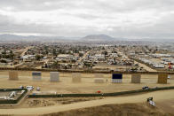 <p>Prototype U.S.-Mexico border walls stand in this aerial photograph taken over San Diego, Calif., on Monday, Oct. 30, 2017. (Photo: Daniel Acker/Bloomberg via Getty Images) </p>