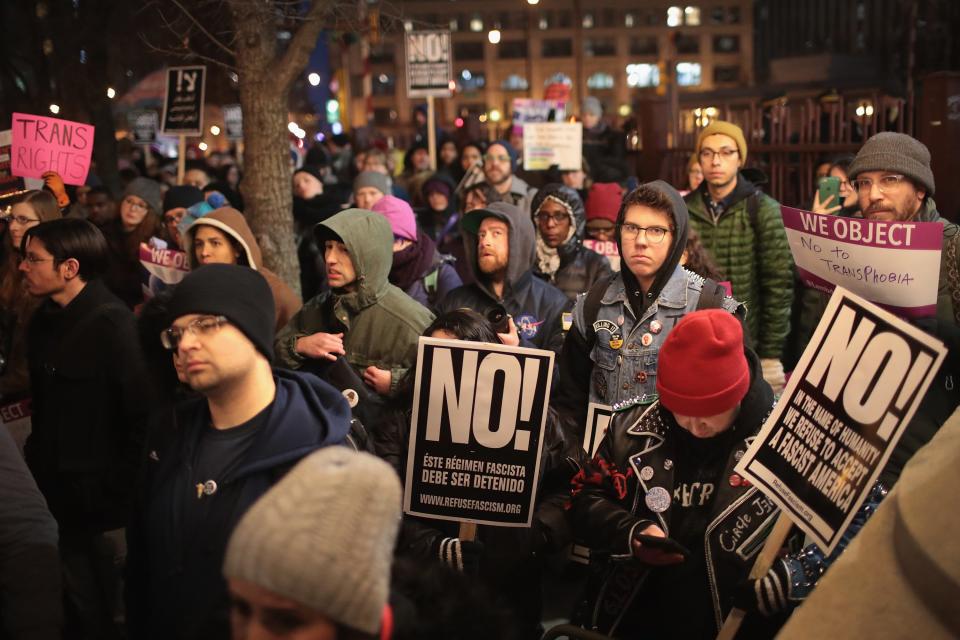 Demonstrators protest for transgender rights with a rally, march through the Loop and a candlelight vigil to remember transgender friends lost to murder and suicide on March 3, 2017, in Chicago. The demonstration was sparked by President Donald Trump's decision to reverse the Obama administration policy requiring public schools to allow transgender students to use the bathroom that corresponds with their gender identity.