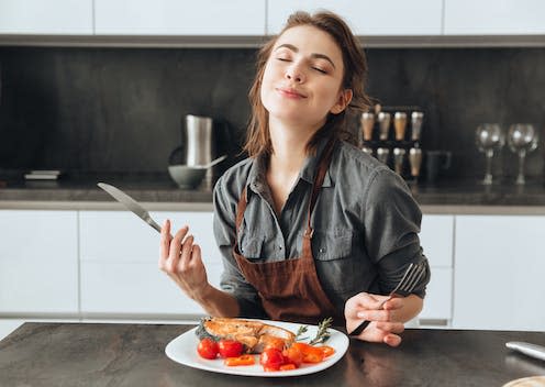 <span class="caption">Ever wondered why people can't agree on what foods taste good? </span> <span class="attribution"><a class="link " href="https://www.shutterstock.com/image-photo/image-pretty-young-woman-sitting-kitchen-579904396" rel="nofollow noopener" target="_blank" data-ylk="slk:Shift Drive/Shutterstock;elm:context_link;itc:0;sec:content-canvas">Shift Drive/Shutterstock </a></span>