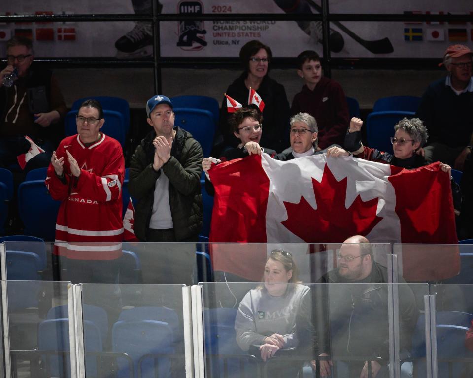 Canada fans applaud the team after scoring against Czechia Sunday at the Adirondack Bank Center in Utica.