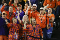 Clemson fans cheers during media day for NCAA College Football Playoff national championship game Saturday, Jan. 11, 2020, in New Orleans. Clemson is scheduled to play LSU on Monday. (AP Photo/Gerald Herbert).