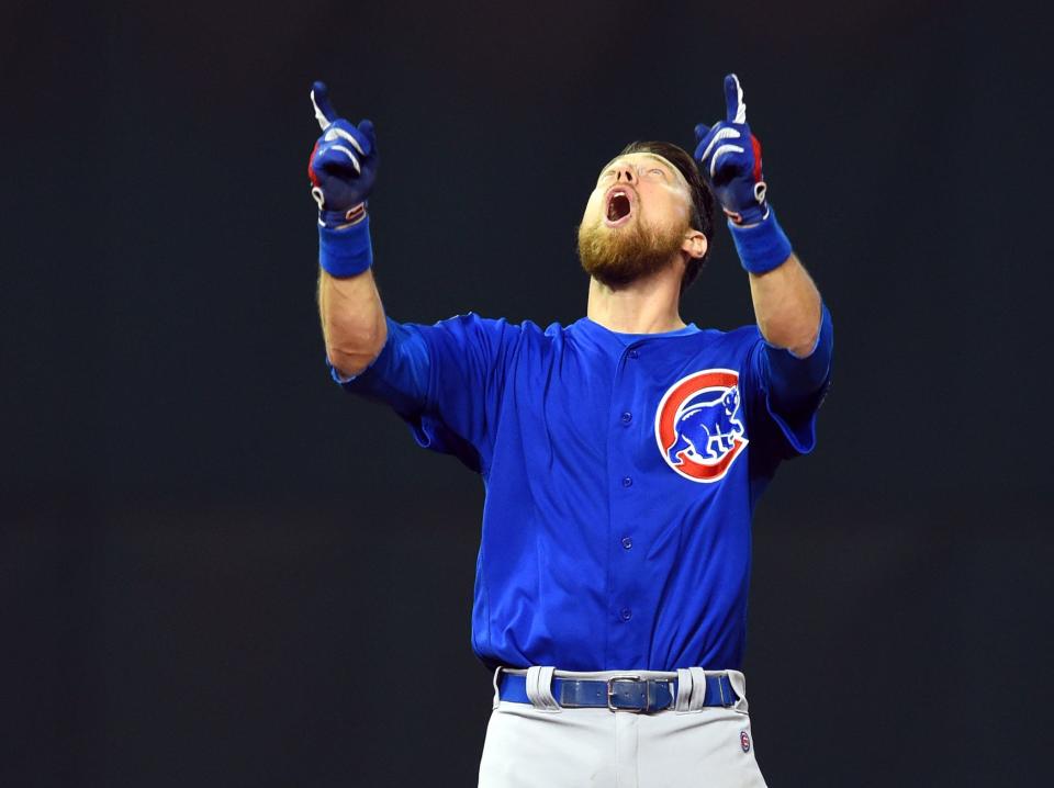 Chicago Cubs outfielder Ben Zobrist celebrates after hitting a RBI double against the Cleveland Indians in the 10th inning in game seven of the 2016 World Series at Progressive Field.