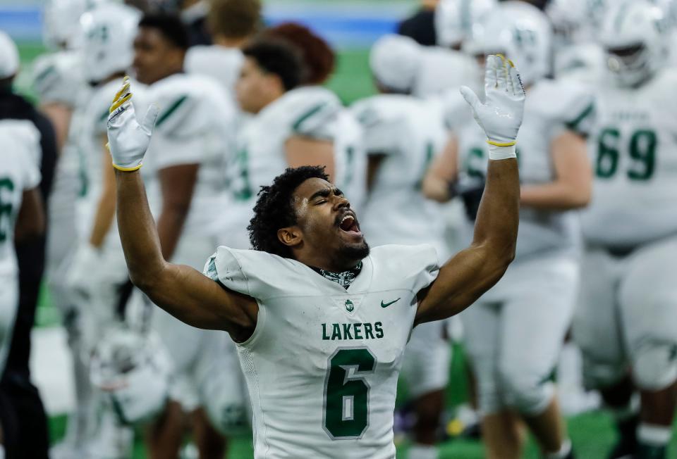 West Bloomfield running back Donovan Edwards cheers for his team against Davison during the first half of the MHSAA Division 1 final at Ford Field, Saturday, Jan. 23, 2021.