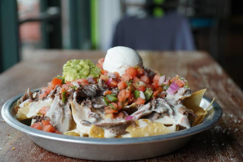 Shaved filet mignon nachos are $15 at Tipsy Taco.