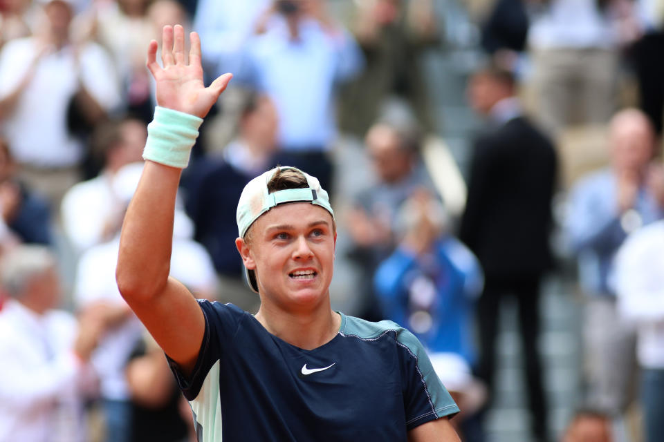 Holger Rune (pictured) celebrates after defeating Stefanos Tsitsipas on Philipe Chatrier court.