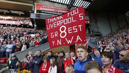 Football - Liverpool v Crystal Palace - Barclays Premier League - Anfield - 16/5/15 Liverpool fans hold up a banner for Steven Gerrard after his final game at Anfield. REUTERS/Carl Recine