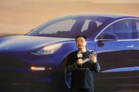 Tesla's China chief Zhu Xiaotong speaks at a delivery ceremony for China-made Tesla Model 3 vehicles in the Shanghai Gigafactory of the U.S. electric car maker in Shanghai