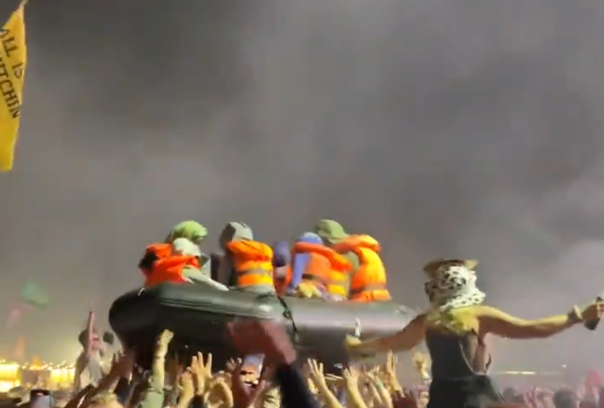 Inflatable ‘migrant boat’ during Idles set at Glastonbury (Twitter)