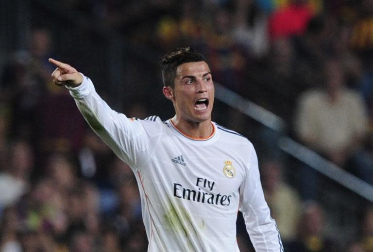 Cristiano Ronaldo plays for Real Madrid against Barcelona at the Camp Nou stadium in Barcelona on October 26, 2013