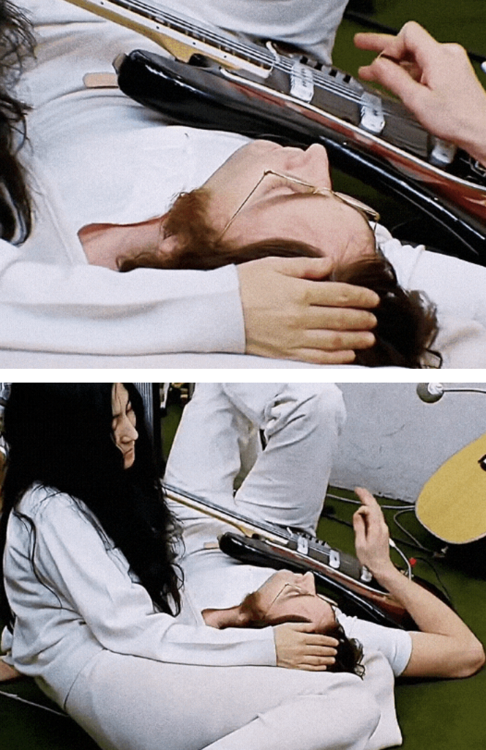 Yoko patting John's head