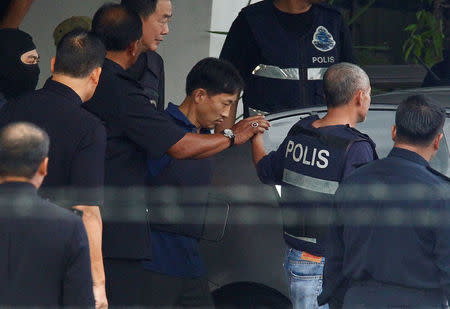 North Korean suspect in Kim Jong Nam murder, Ri Jong Chol, leaves a Sepang police station to be deported, in Malaysia. REUTERS/Alexandra Radu