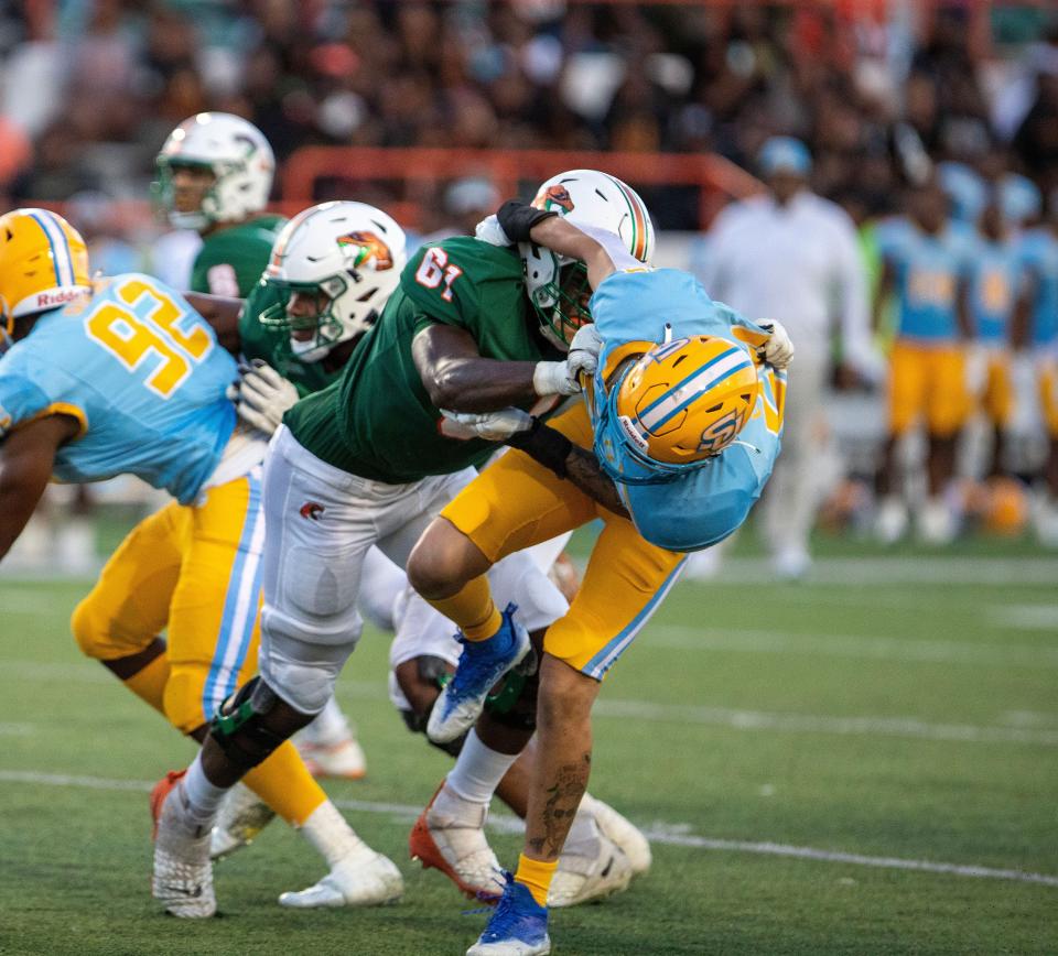 Florida A&M offensive linemam Jalen Goss flatlines a Southern Jaguars defender in Southwestern Athletic Conference matchup at Bragg Memorial Stadium in Tallahassee, Florida, Saturday, Nov. 5, 2022.