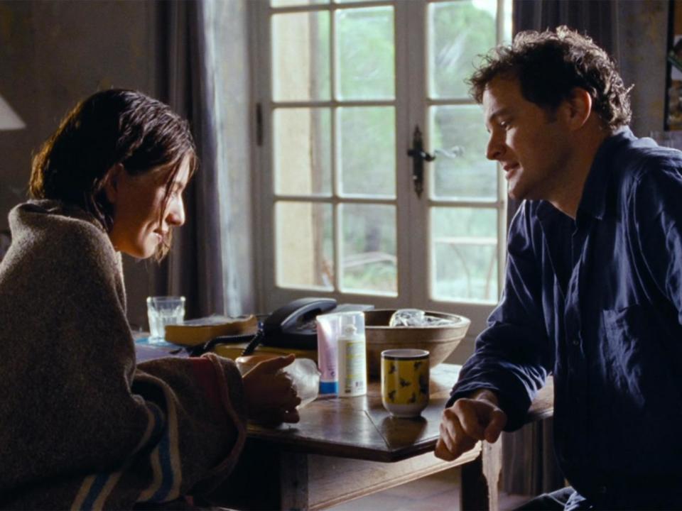 Colin Firth as novelist Jamie and his Portuguese housekeeper Aurelia (Lucia Moniz) who speaks no English