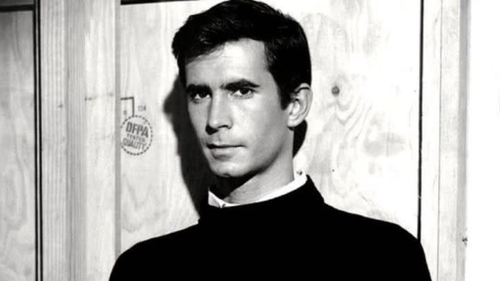 Anthony Perkins as Norman Bates looking at the camera in the film Psycho.